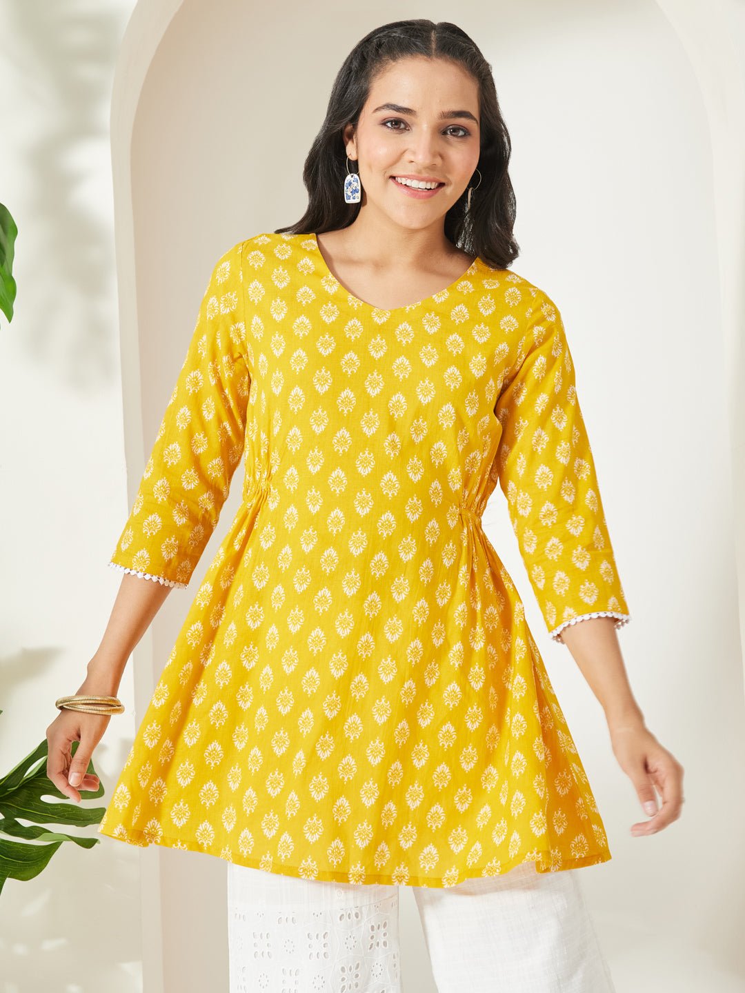 JAA26TU04282_1.jpg Yellow Pure Cotton Ethnic Motifs Printed A-Line Short Kurti - Image 1